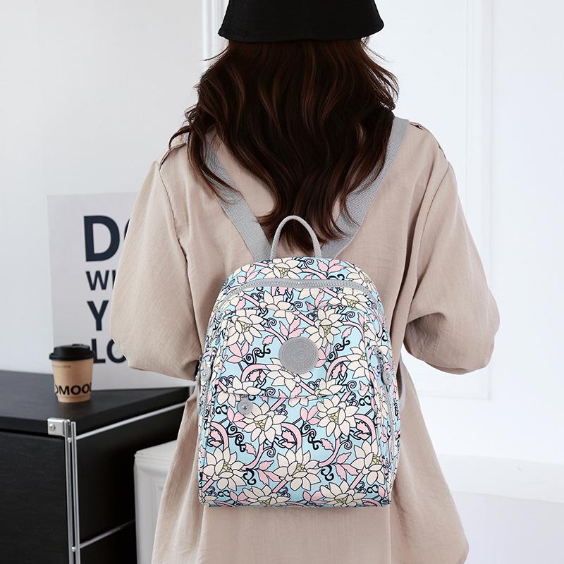 Schoolbag Casual Printed Backpack Women's Large Capacity Shell Bag 1011 New Women's Commuter Small Backpack Nylon School Bag