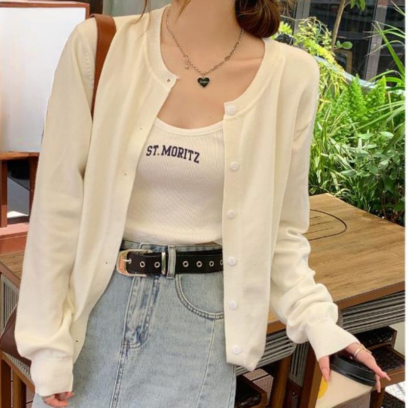 A New Style of Women's Knitted Cardigan Sweater Coat Paired with A Loose Top