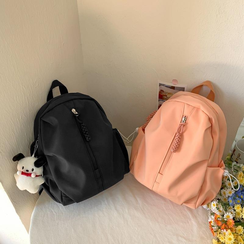 School bag female college students simple niche design sense backpack high value junior high school students leisure travel backpack