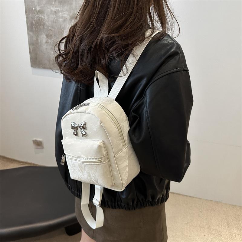 Schoolbag Bow Backpack Women's Niche Design Fashion Korean Edition School Bag 1011 Autumn and Winter Lightweight Small Travel Backpack