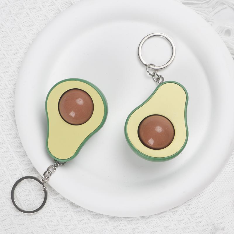 Брелок-бусина в виде шарика авокадо для снятия стресса — фото 3