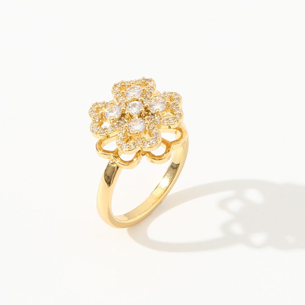 Blütenblatt Kupfer Schmuck Damen Drehbarer Ring Mit Galvanisierter Oberfläche Für Modeaccessoires