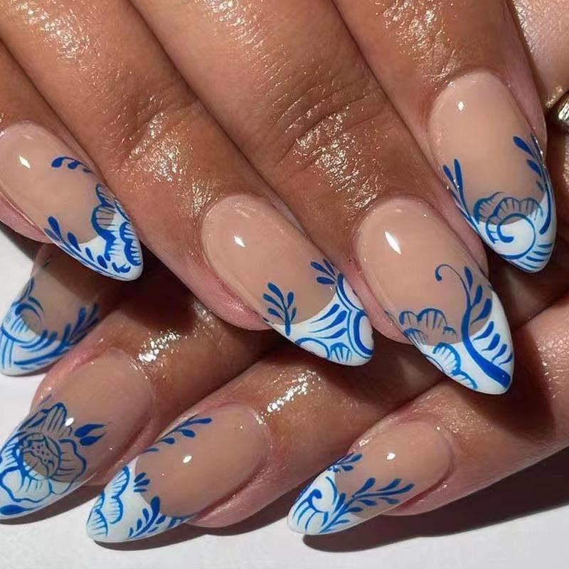 

Almond White French Nails with Blue Flowers - Press-On, Removable Nail Art Tips