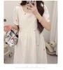 2026 Summer White Short Sleeve Maternity Wear: Simple, Loose, and Slimming Design