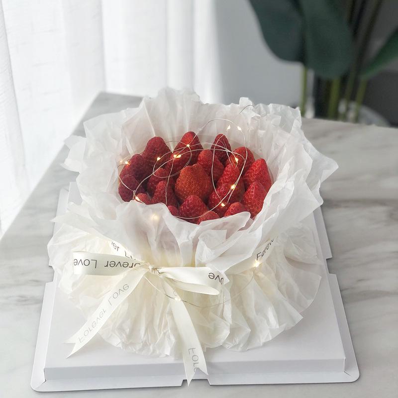 Valentine's Day Celebrity Bouquet: Fresh Flowers, Cake Decoration, Tissue & Transparent Wrapping Paper.