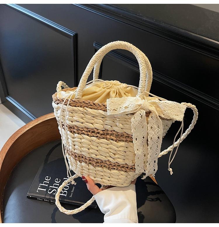 New Woven Bag Women's Spring Niche Design Portable Bucket Bag Crossbody Shoulder Straw Bag