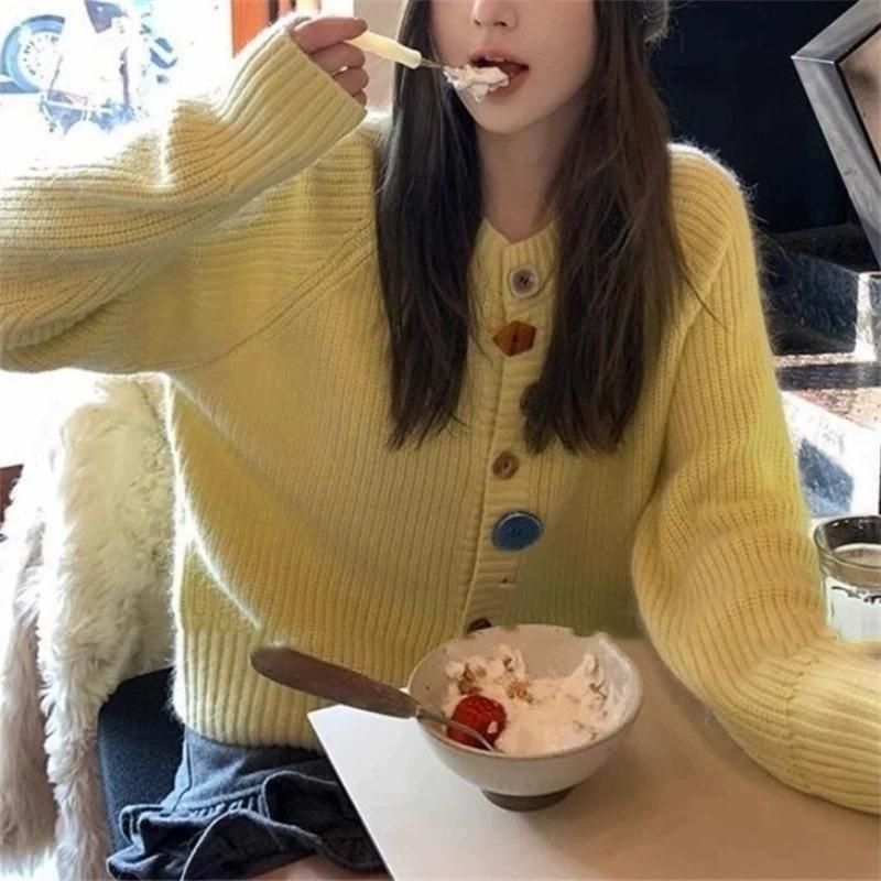 Design sense niche irregular color button knitted cardigan women's autumn and winter new age-reducing gentle wind sweater jacket