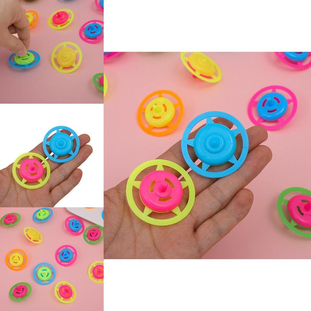 Plastic Spin Gyroscope Toy For Children With Colorful Candy Design And Traditional Play Use