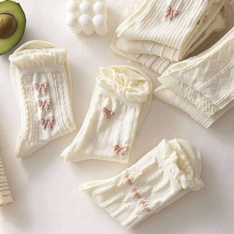 Chaussettes blanches simples, polyvalentes, jolies, nœuds papillon, petites fleurs, chaussettes tube moyennes pour femmes, Kawaii Harajuku Jk Lolita, chaussettes en coton pour filles