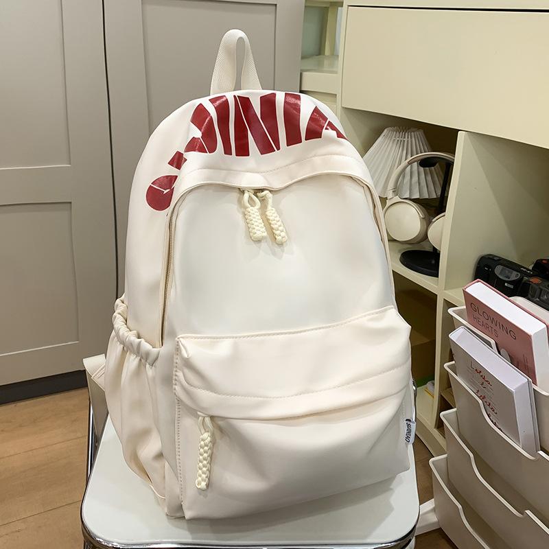 Hochwertiger modischer einfacher Buchstaben-Print lässiger Rucksack Schüler vielseitig große Kapazität Pendlerrucksack