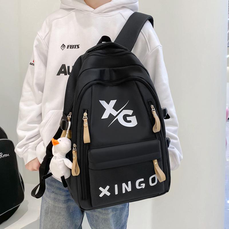 Schoolbag1011 new large-capacity backpack to reduce the burden of small, medium and early college students schoolbags, street trend travel bags,