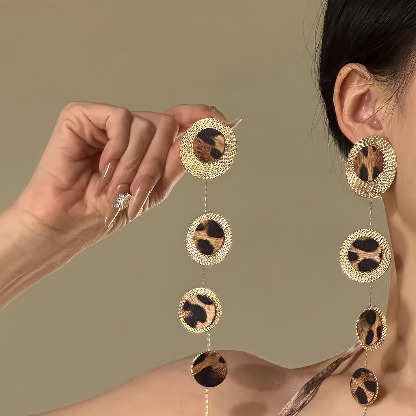 

Модные серьги-подвески для женщин золотой