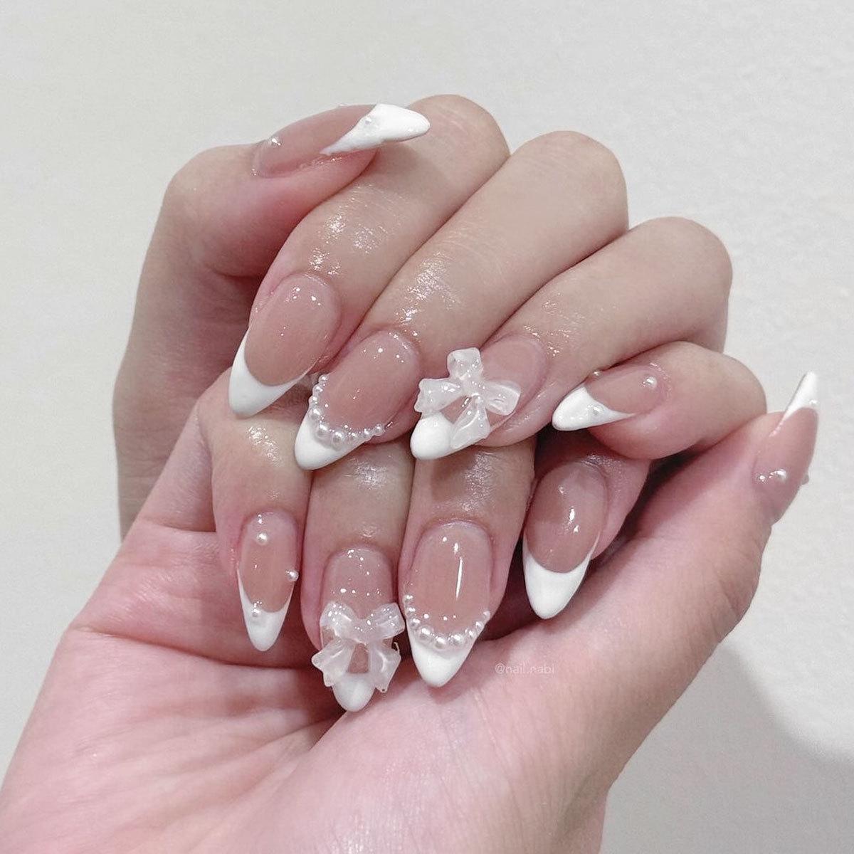 

Pearl Bow Almond French Tip Press-On Nails
