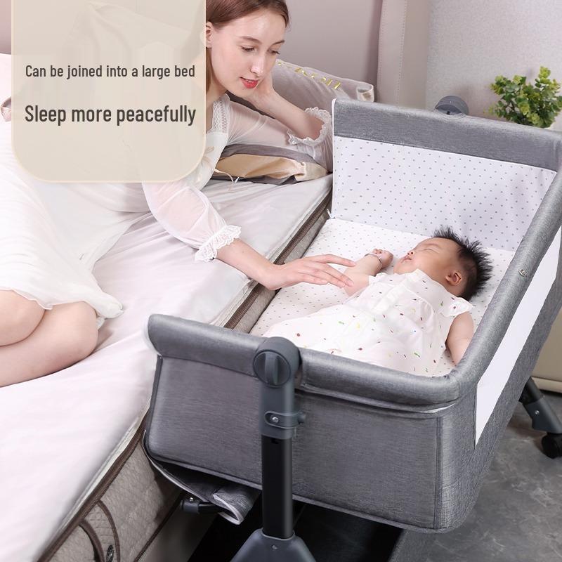 Multifunctional Foldable Baby Cradle Bed: Newborn Crib & Children's Bed with Mobile Splicing.