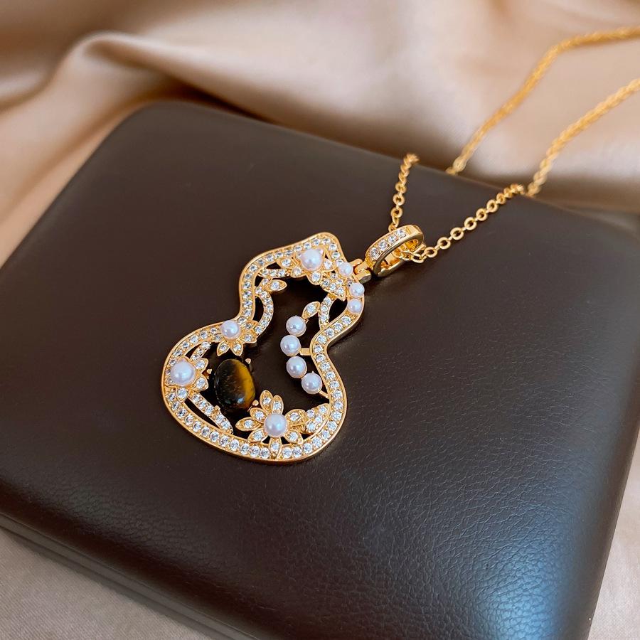 Серьги в стиле Майяра с цирконом, тыквой, полым тигровым глазом и жемчугом, легкая роскошь, высококачественный ушной крючок, персонализированные серьги