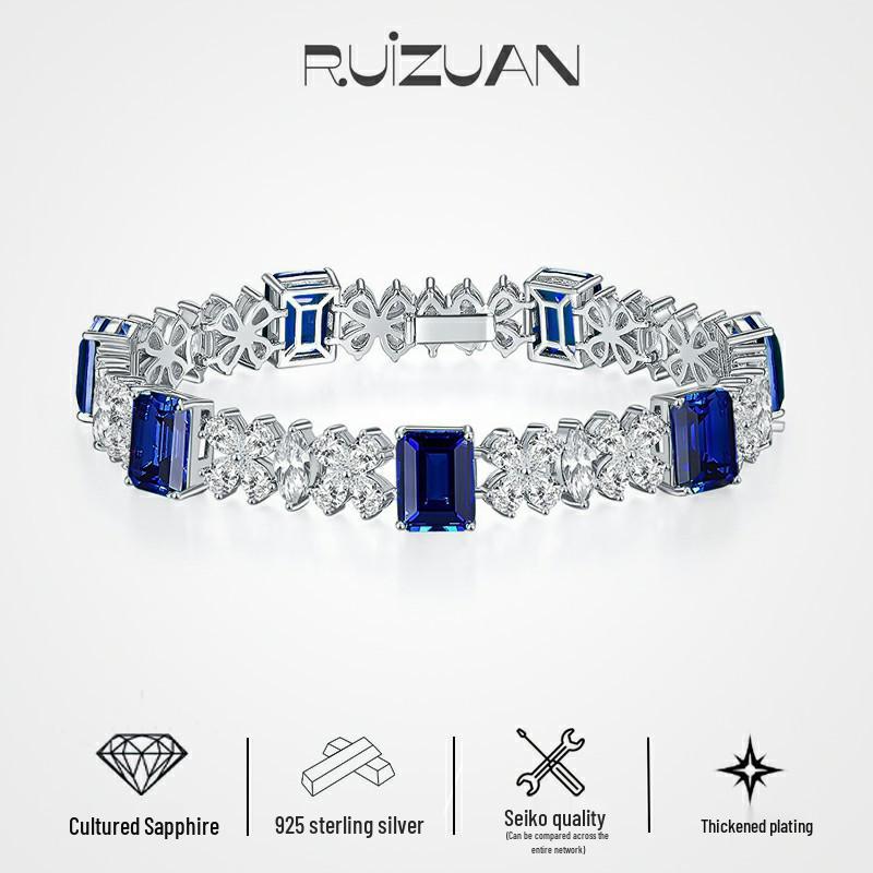 

Elegant Cultured Blue Sapphire Sterling Silver Bracelet - 7x9mm 16cm Chain