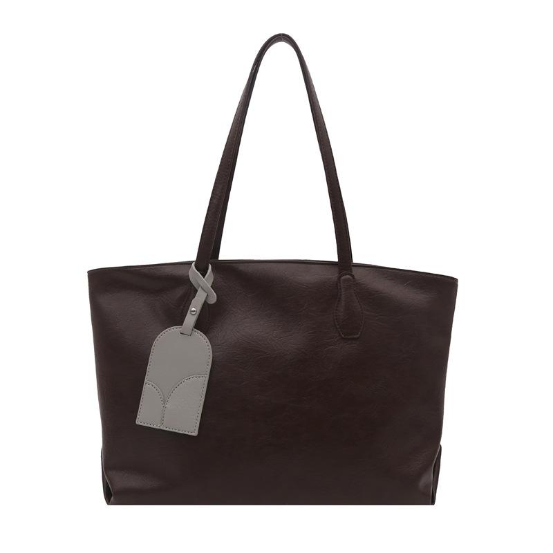 

Autumn and winter retro large-capacity bag women s 2025 new fashion versatile tote bag work commuter bag shoulder bag темно-коричневого