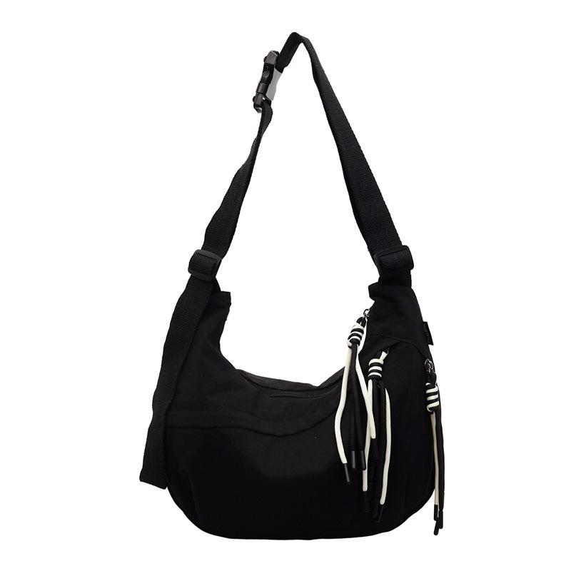 

Minimalist Shoulder Bag for Women with Adjustable Strap and Tassel Detailing Lightweight Hobo Bag for Daily Use чёрный