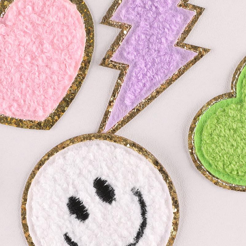 Embroidery label towel embroidery Phnom Penh Chenier smiley face badge lightning accessories cloth label patch embroidery cloth sticker