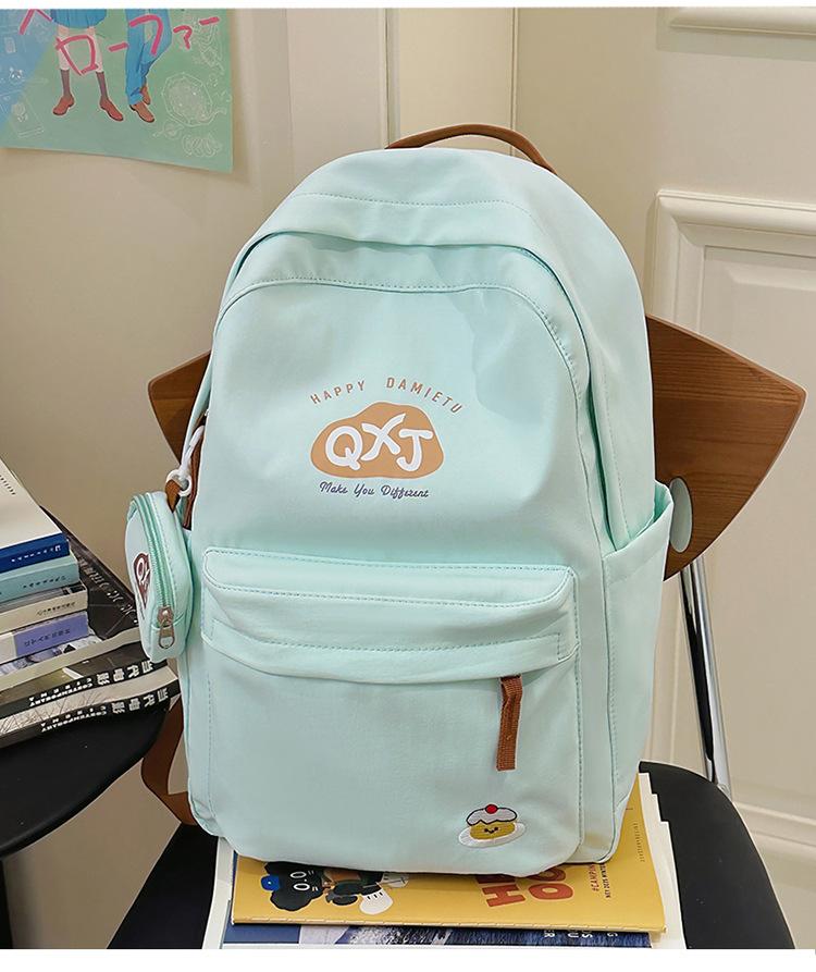 School bag for junior high school students, ultra-light and cute large-capacity school bag for leisure and travel, shoulder bag, niche and