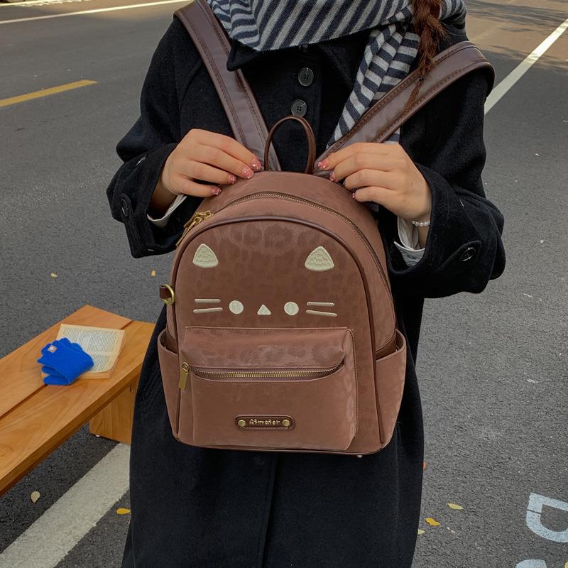 Schoolbag Korean version retro large-capacity backpack niche design cute kitten student schoolbag versatile popular commuter backpack