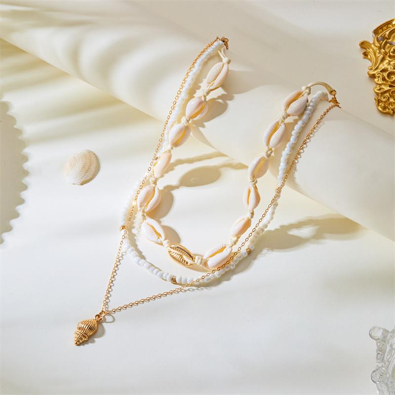 Layered Cowrie Shell Necklace for Women Boho White Beaded Choker Golden-Tone Conch Pendant Summer Beach Vacation Jewelry