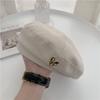 Woolen beret children autumn and winter new French beret versatile Internet celebrities show face small metal label painter hat