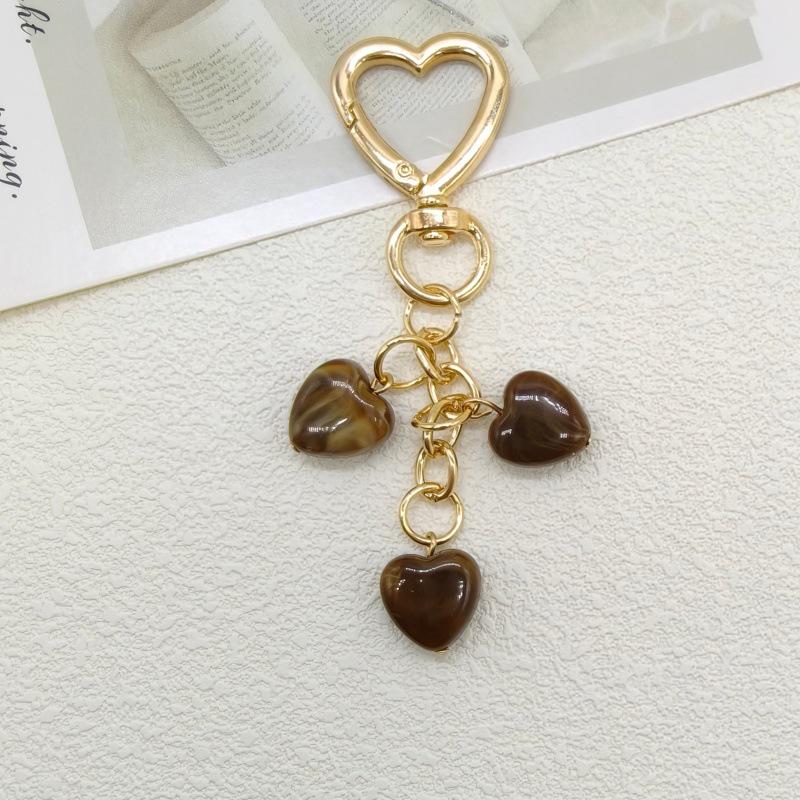 Koreańska Moda Breloczek z Serduszkiem i Smyczka do Telefonu z Zawieszką z Koralików