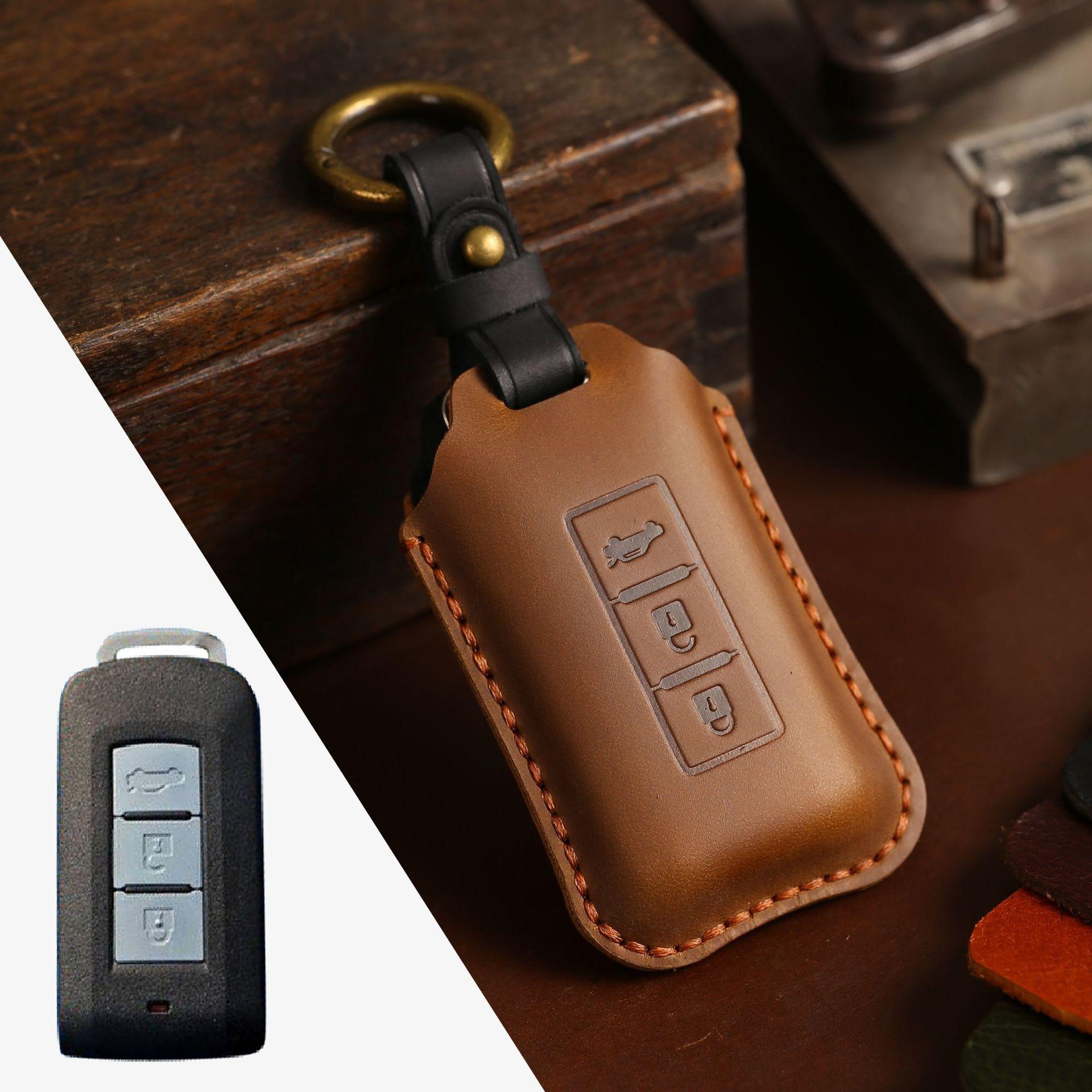 

The key cover is suitable for Mitsubishi key cover Outlander Yige Jinxuan ASX car key cover genuine leather.
