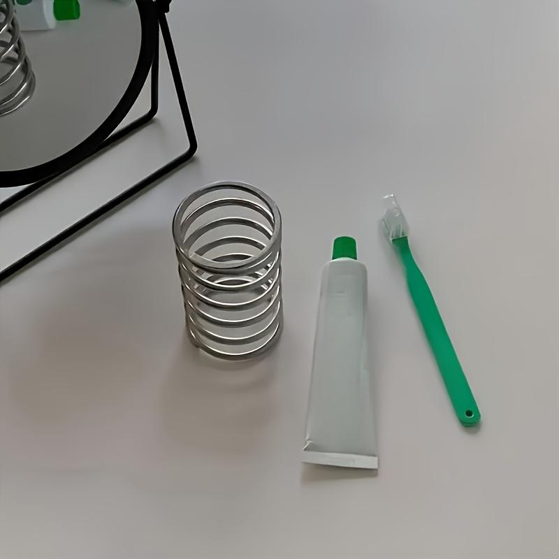 Spiralförmiger Schreibtischorganizer aus Edelstahl Multifunktionaler hohler Stifthalter Badezimmer Zahnbürstenständer Heim Arbeitsplattenzubehör