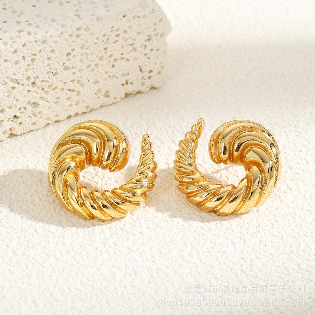 European-American Gold Stainless Steel Spiral Horn Pattern Stud Earrings - Elegant and Simple Design.