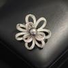 New micro-inlaid zircon knotted stone-inlaid flower brooch temperament pearl flower anti-light pin coat accessories women