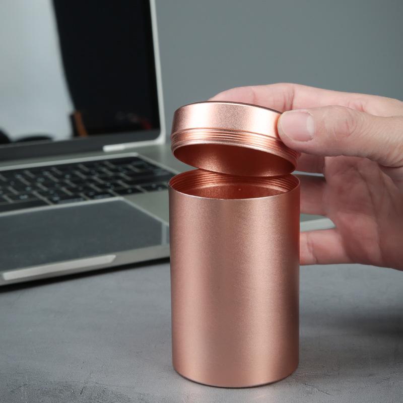 Compact Titanium-Aluminum Tea Storage Can: Small, Portable, and Sealed.