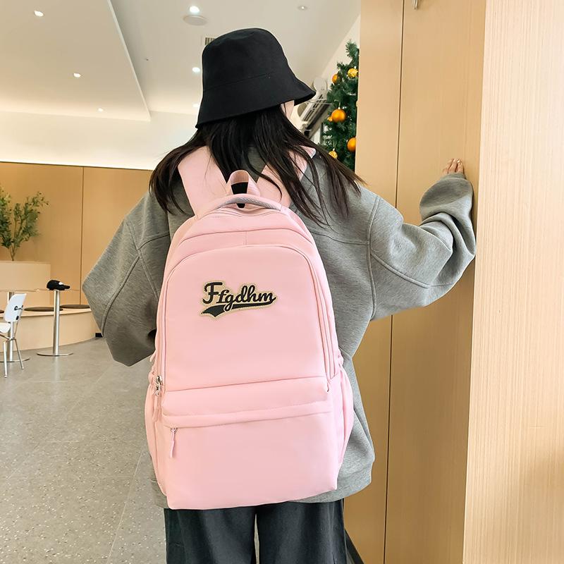 Weiblicher Rucksack mit großer Kapazität, einfarbig, Brief, Schüler, Schulranzen, männlicher Outdoor-Rucksack