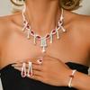 Design feels retro, exaggerated, atmospheric, chic, necklace, earring, ring, bracelet set, paired with wedding dress