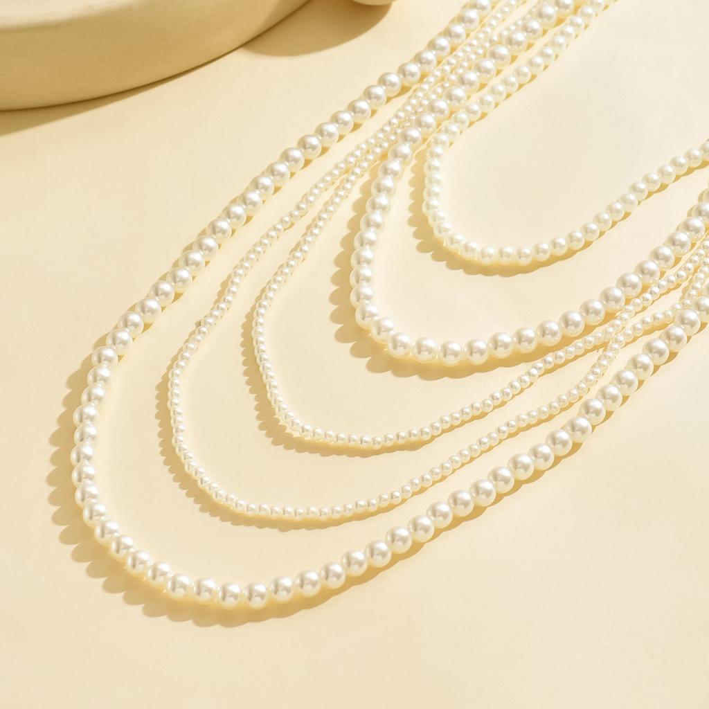 Vintage Y2K light luxury multi-layer pearl necklace niche design cold wind pearl choker handmade collarbone chain