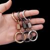 Creative Metal Double Loop Keychain with Pendant – Stylish Spring Ring Design