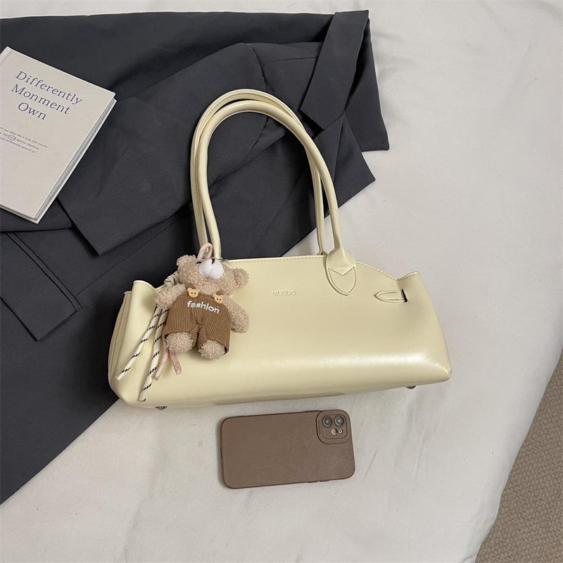 

Весенние и летние сумки женские сумки большой вместимости с высоким чувством стиля универсальные сумки через плечо нишевые дизайнерские сумки No pendant жёлтый