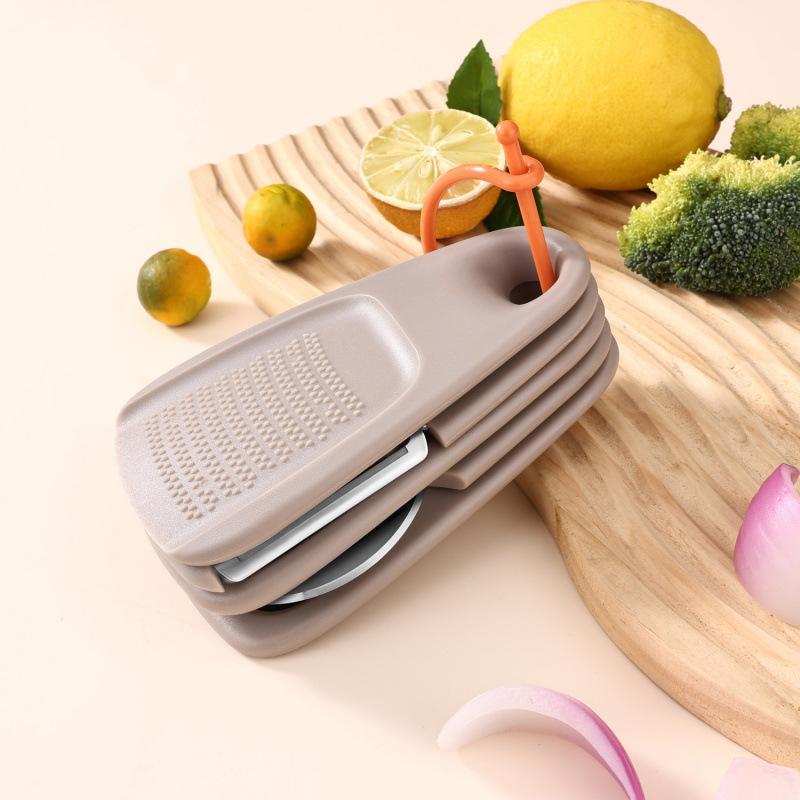 Multifunctional 5-in-1 Portable Kitchen Gadget Peeler Bottle Opener Garlic Grinder Cheese Grater