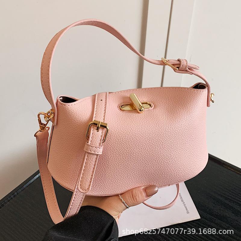 2025 new solid color temperament handbag large-capacity women's bag niche casual one-shoulder real high-end messenger bag