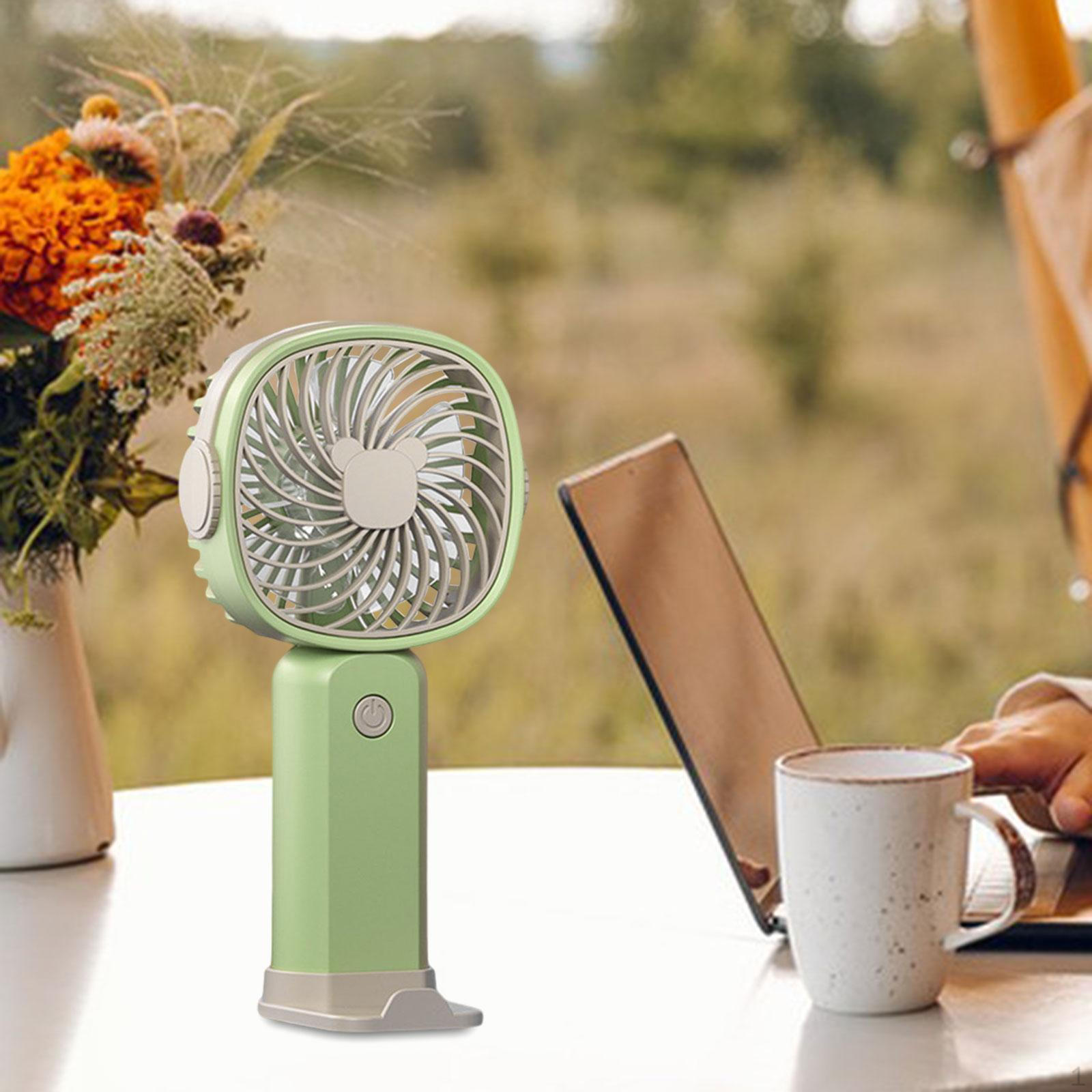 

Компактный ручной вентилятор с регулируемой скоростью и подставкой для телефона для путешествий и активного отдыха зелёный