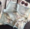 New silk scarf women's fashion versatile sense 70 square scarf neck protection scarf spring and autumn retro scarf tied bag