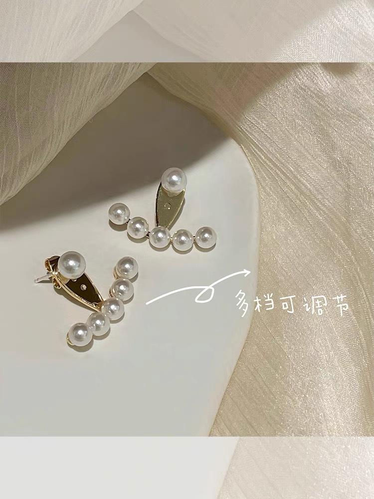 Niche design sense high-end light luxury pearl stud earrings women's year new trendy Korean temperament earrings