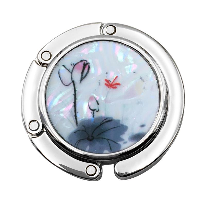 Kreativer runder Muschel Falt-Handtaschenhaken - Flacher Clip Aufhänger für Tischkante Taschenzubehör