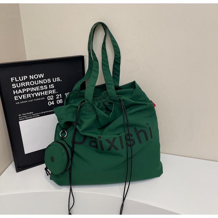 College students commute to class, large-capacity tote bag, women's 2025 new leisure child and mother canvas shoulder handbag