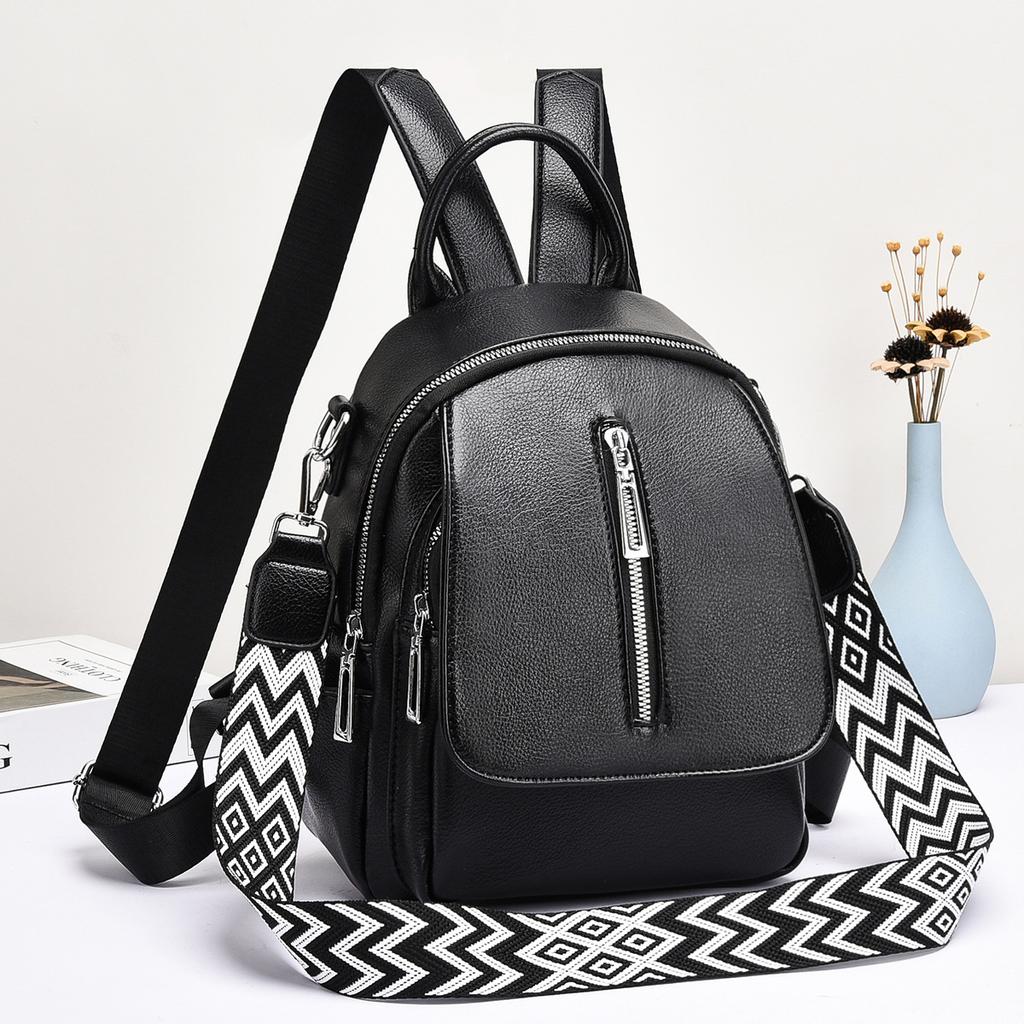 Backpack women's trendy women's bag texture solid color travel bag PU material