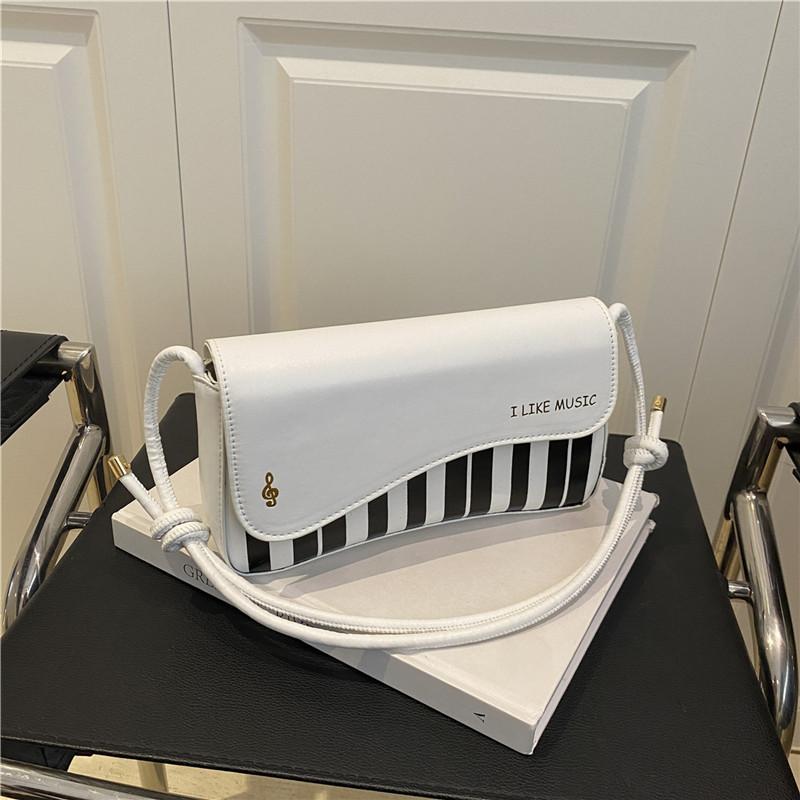 

Контрастний колір друку клавіш піаніно, трендовий нішевий дизайн, нова мода, сумка-месенджер на плече/під пахви, жіноча сумка білий