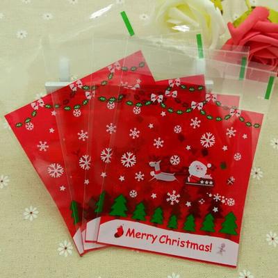 Sacchetti regalo in plastica autoadesivi da 100 pezzi Pacchetto di caramelle per biscotti di Babbo Natale di buon Natale