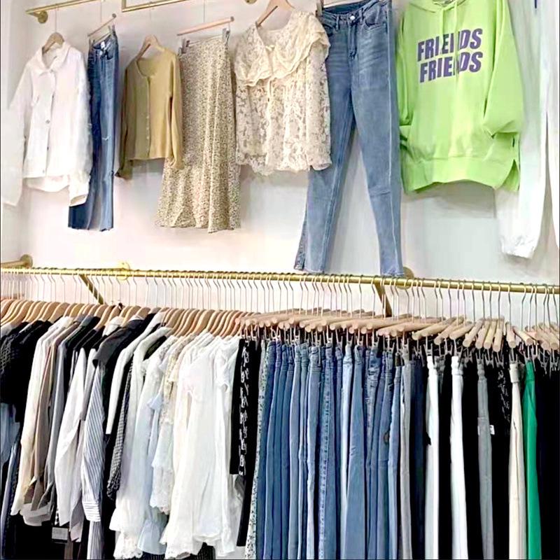 Wall-Mounted Clothing Display Rack for Women's and Children's Wear Stores