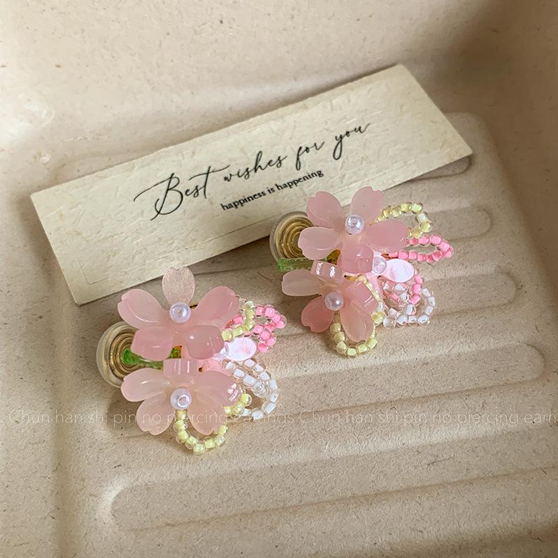 

Seaside vacation beaded tassel dopamine ear clips mosquito coil disc without ear piercings girly feeling sweet wind flower stud earrings